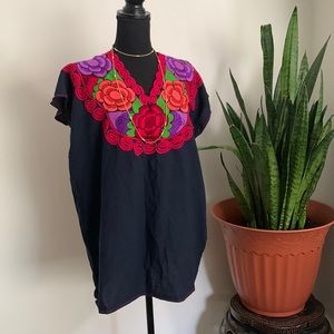 Typical Mexican blouse with embroidery multicolor black has not tag look like L